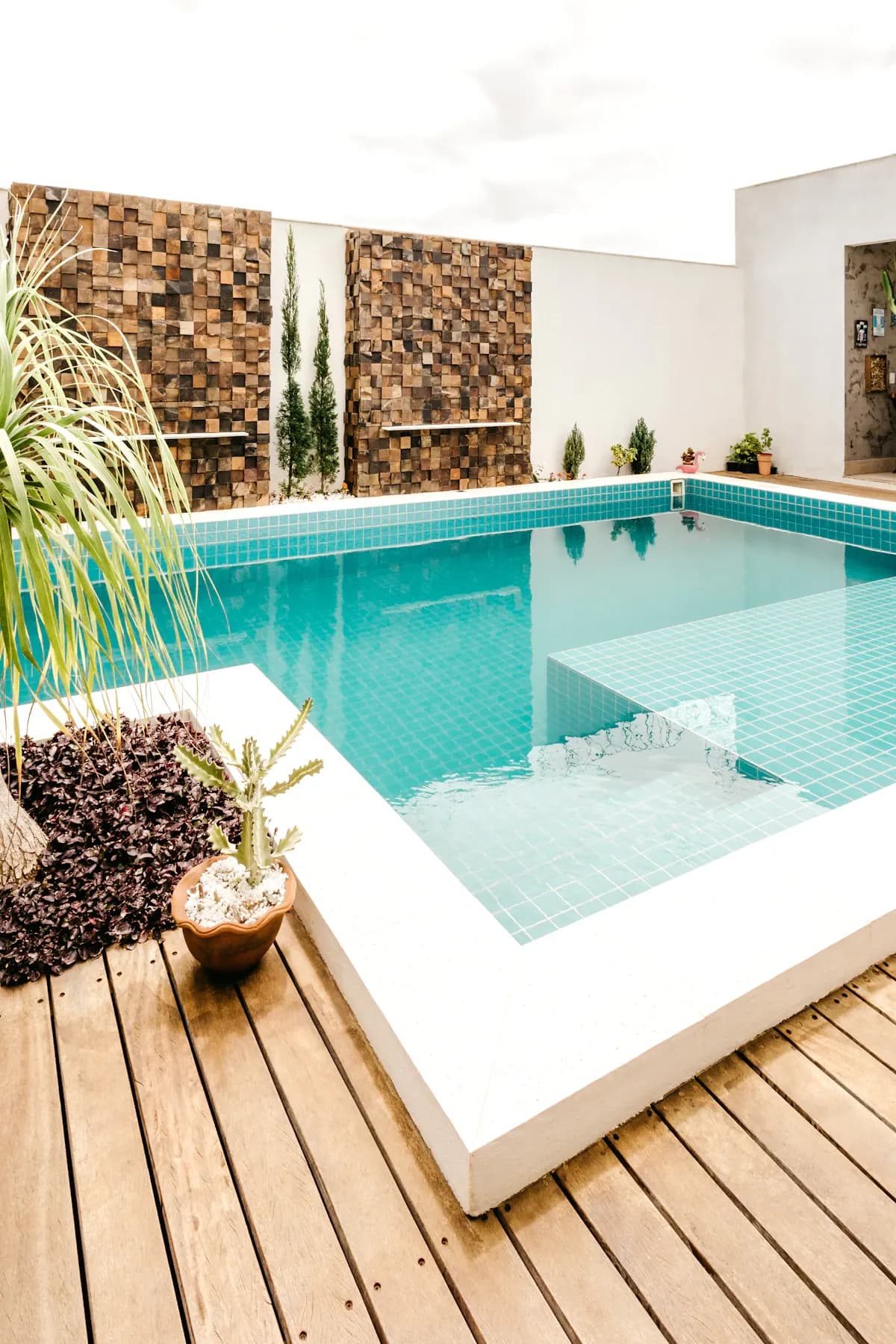 Small rectangular pool beside timber decking