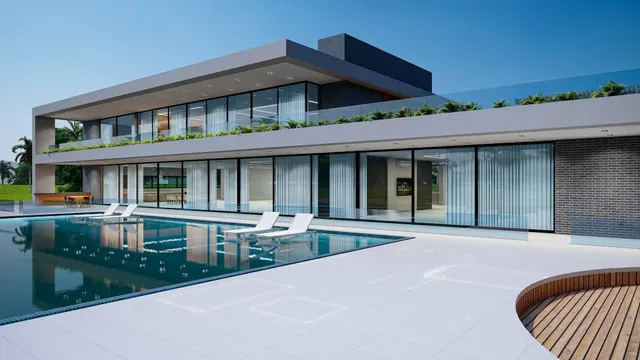 Long pool beside a covered outdoor living area